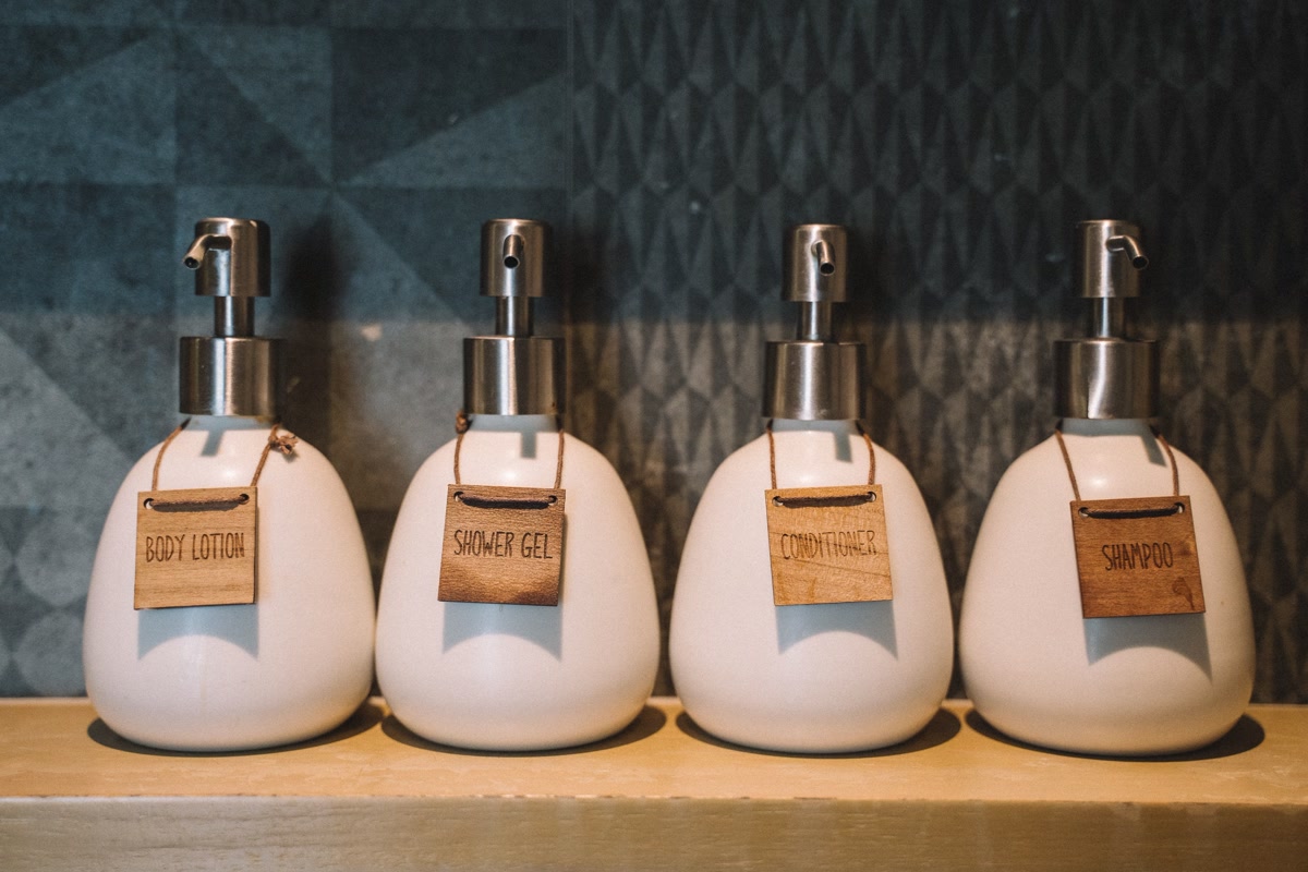 Dog shampoo bottles on bathroom counter
