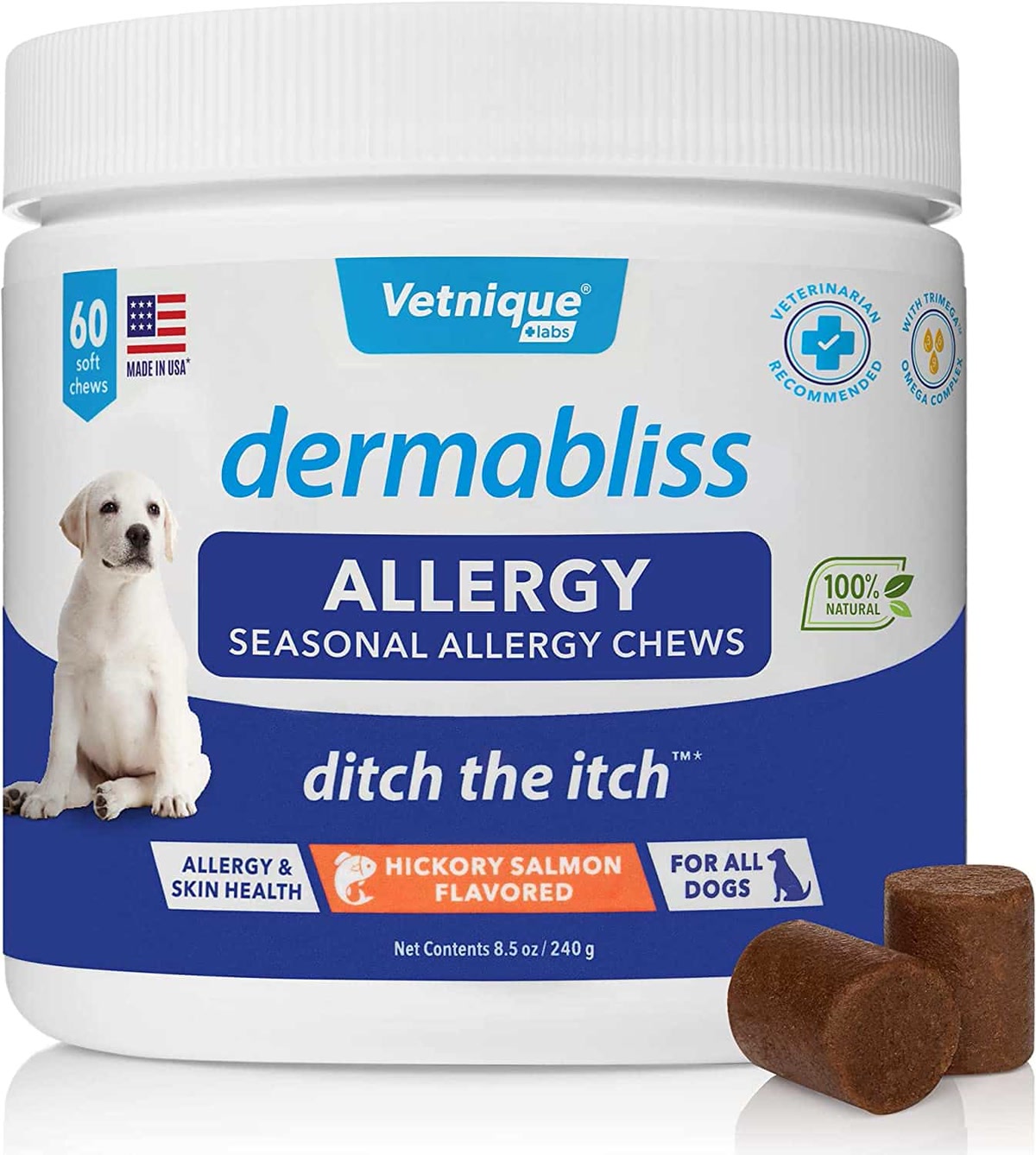 Person with allergies cuddling their dog on the couch with an air purifier running nearby
