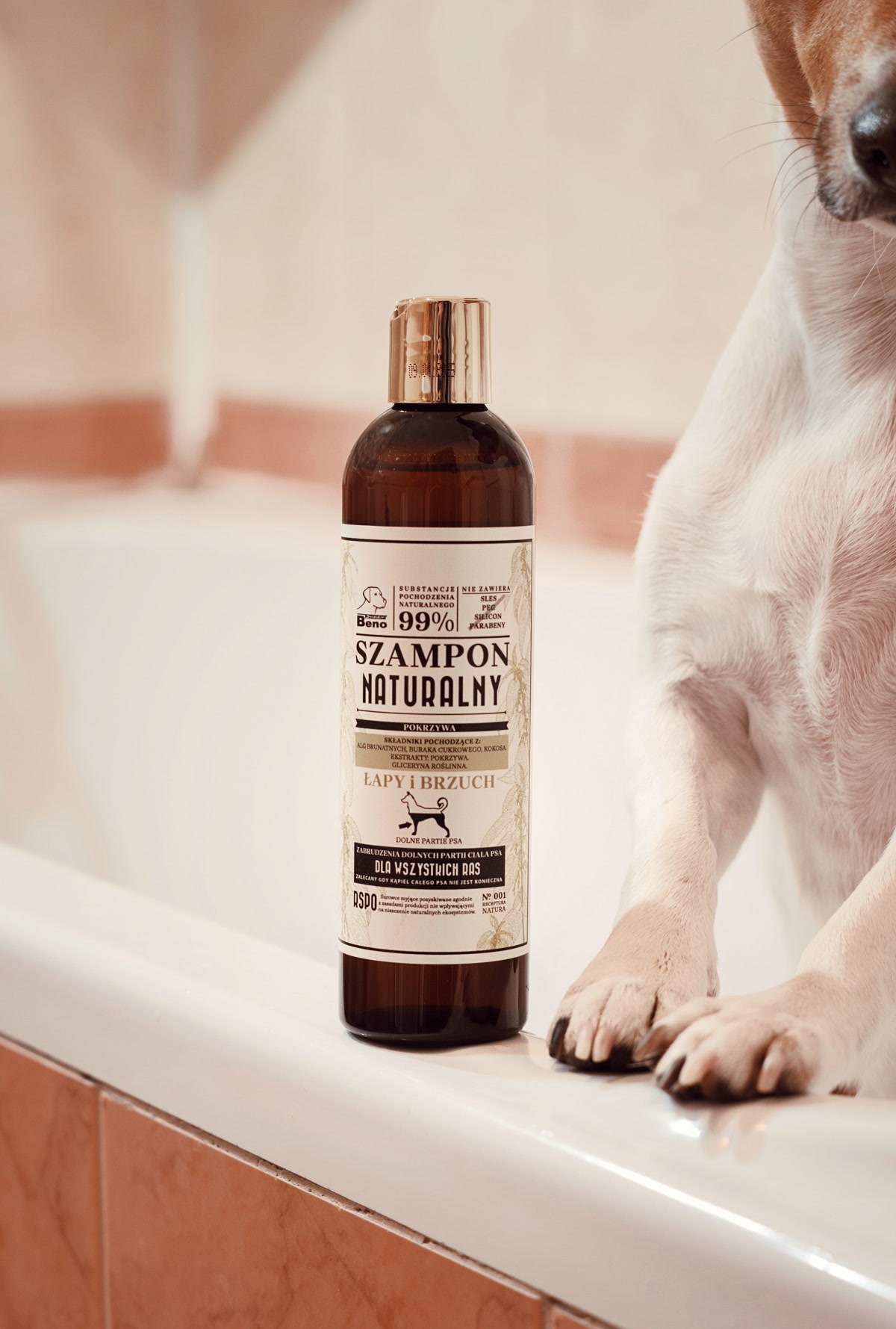 A Dog Standing in a Bathtub with a Bottle of Dog Shampoo
