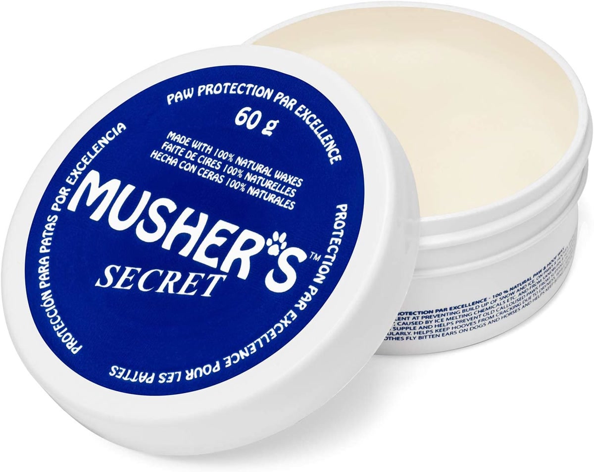 Musher's Secret paw wax balm container for protecting dog paw pads
